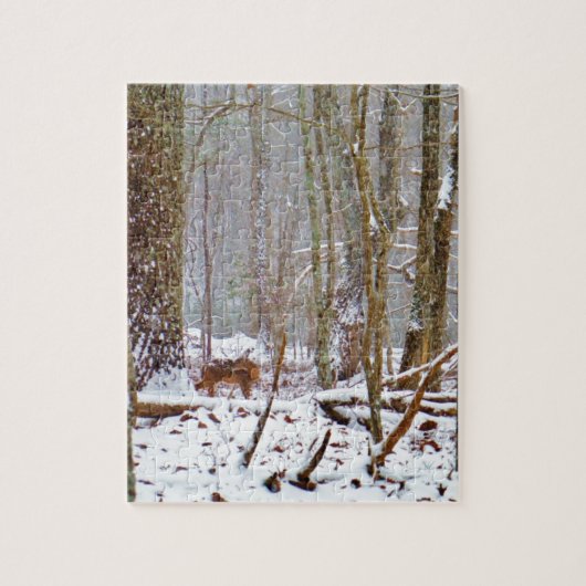 Deer in the snow, licking leg legpuzzel (Verticaal)