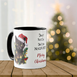 Definieer ondeugende kat die in kerstverlichting i mok