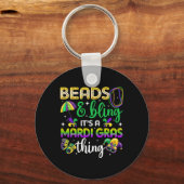 Dekken en lenen Het is een mardi gras-mannetje. Sleutelhanger (Voorkant)