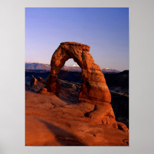 Delicate Arch bij zonsondergang met besneeuwde La Poster