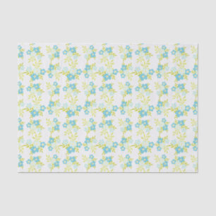 Delicate blauwe bloemen groene bladeren op wit tissuepapier