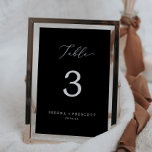 Delicate Dark Black Calligraphy Wedding Kaart<br><div class="desc">Dit delicate donkerzwarte kalligrafie trouwtafelnummer is perfect voor een moderne bruiloft. Het romantische minimalistische ontwerp heeft een mooie en elegante witte typografie op een zwarte achtergrond met een schone en eenvoudige uitstraling. De kaart prints aan de voor- en achterkant (dubbelzijdig). Items worden precies afgedrukt zoals ze op uw scherm verschijnen...</div>