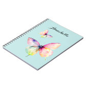 Delicate roze vlinder in pastel regenboog kleuren notitieboek (Linkerzijde)