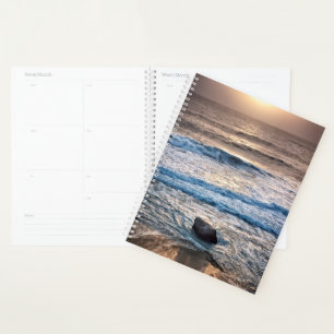Delicate strand zonsondergang planner