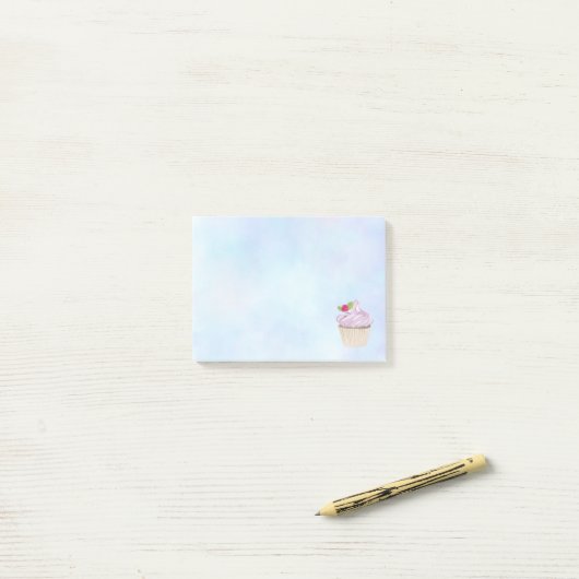 Delicious roze roze koekjesbes bovenaan post-it® notes (Op bureau)