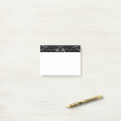 Delig florale herhalende patroon in wit op zwart post-it® notes (Op bureau)