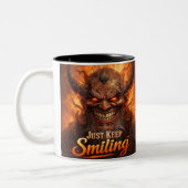 Demonic Grin “Just Keep Smiling” Design Tweekleurige Koffiemok (Links)