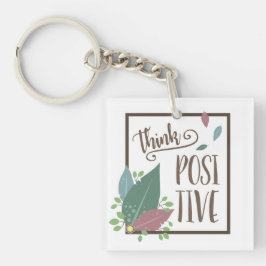 Denk aan positieve motivatie en veer boho sleutelhanger