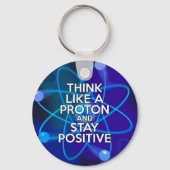Denk als een proton en blijf positief leuk citaat sleutelhanger (Voorkant)