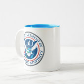 Department of Homeland Stupidity Tweekleurige Koffiemok (Voorkant links)