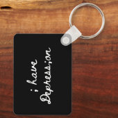 ; depressie hebben sleutelhanger (Achterkant)