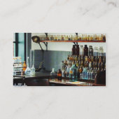 Desk met flessen chemicaliën visitekaartje (Achterkant)