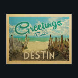 Destin Beach Vintage Travel Briefkaart<br><div class="desc">Deze Greetings from Destin  briefkaart design is voorzien van een zandstrand met een prachtig turquoise oceaanwater en boven het zee,  een blauwe hemel met blauw witte wolken. In de klassieke reisstijl.</div>