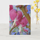 Detail van bloedende harten en Brunnera Jack Kaart (Gele Bloem)