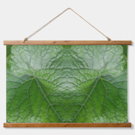 Detail van de groenbladader hangend wandkleed