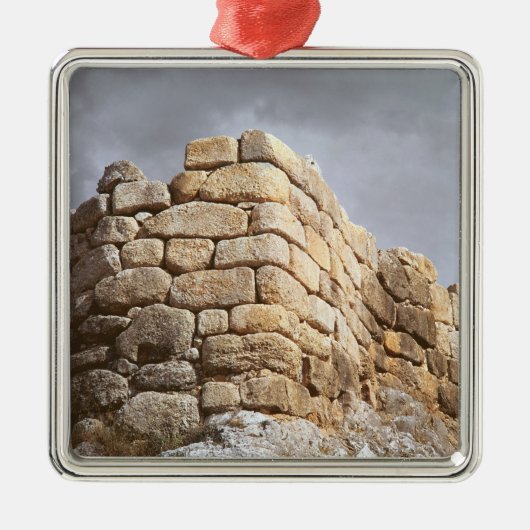 Detail van een stenen muur metalen ornament (Voorkant)