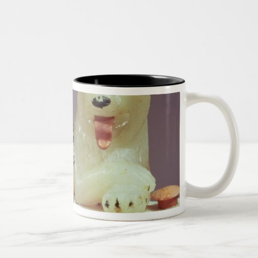 Detail van het deksel van een onbuigzame pot met e tweekleurige koffiemok (Rechts)