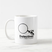 detectives doen het onder de dekking koffiemok (Links)