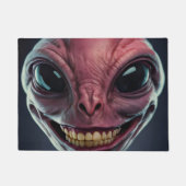 Deurmat met een buitenaards motief. (Voorkant)