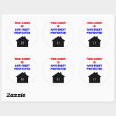 Deze cabine is tegen diefstal beveiligd ronde sticker (Vel)