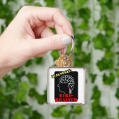 Diagnose: met vogel besmet sleutelhanger (Hand)