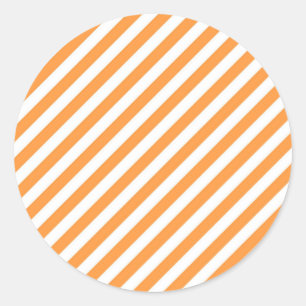 Diagonaal oranje en witte strepenpatroon ronde sticker