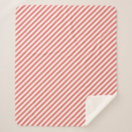 Diagonal pattern of pink and white stripes sherpa deken