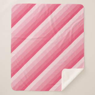 Diagonale ombre strepen in roze tinten sherpa deken