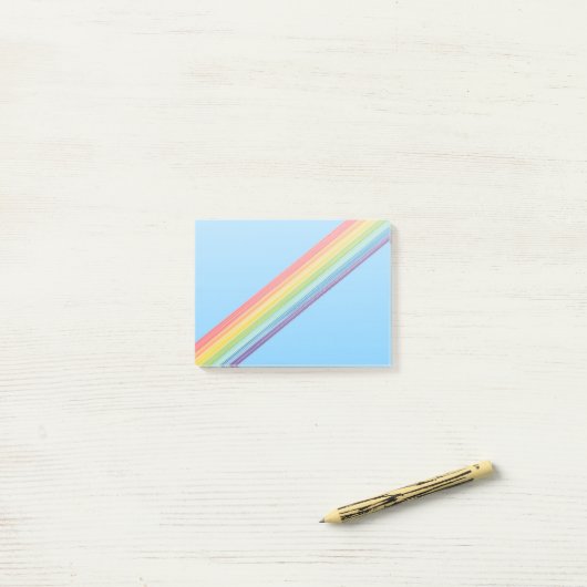 Diagonale regenboogstrepen post-it® notes (Op bureau)