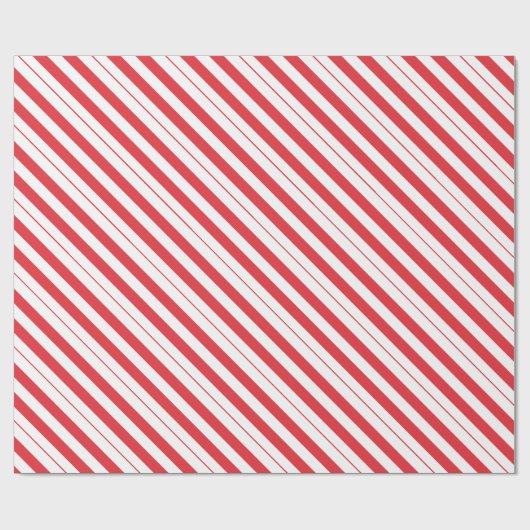 Diagonale strepen van witte en diepe rode snoeprie cadeaupapier