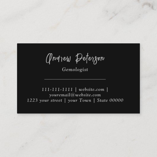 Diamant op zwarte achtergrond met zilveren schrift visitekaartje (Achterkant)