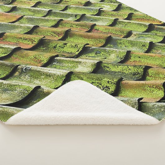 Dichte foto van het groene dakje sherpa deken (3/4)