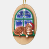 Dichter bij kerstversiering keramisch ornament (Links)
