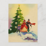 Dickens style Christmas illustration Briefkaart<br><div class="desc">Old English Dickens style Christmas illustration with a family standing in the snow in front of a Christmas tree with bright burning candles.</div>