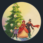 Dickens style Christmas illustration Ronde Sticker<br><div class="desc">Old English Dickens style Christmas illustration with a family standing in the snow in front of a Christmas tree with bright burning candles.</div>