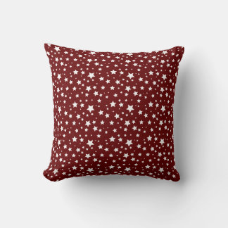 Diep rood kussen met witte ster patroon