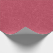 Diep roze gestructureerd draaiend patroon cadeaupapier (Hoek)