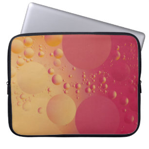 Digitaal roze en oranje bubble laptop sleeve