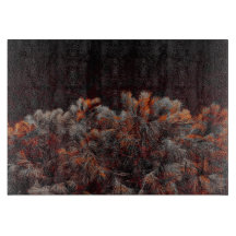 Digitale kunst van dennenbomen met oranje kleurvle