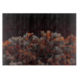 Digitale kunst van dennenbomen met oranje kleurvle snijplank