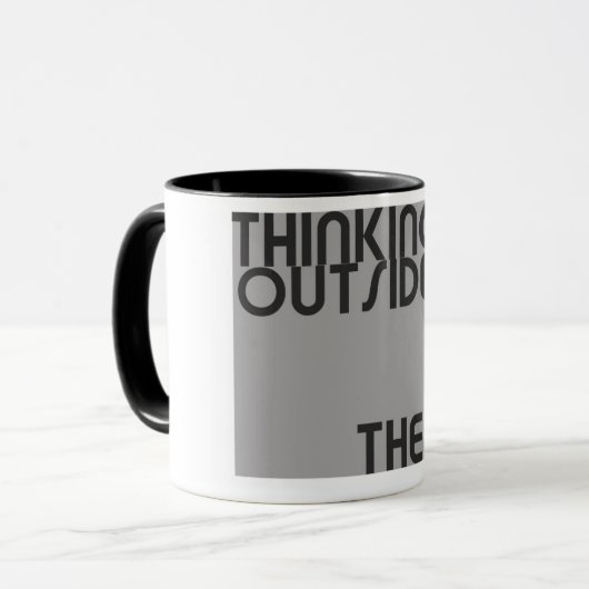 Dinken buiten de doos mok (Voorkant links)