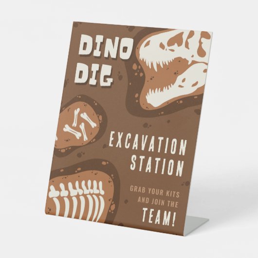 Dino Dig Dinosaurus opgravingsstation Party Reclamebord Met Voetstuk (Voorkant)