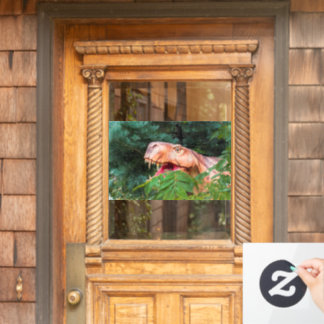 Dino in het bos.  raamsticker