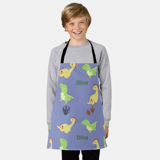 Dino-patroon op blauw schort (Gedragen)