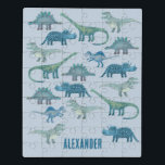 Dinosaur Blue Personalized Puzzel<br><div class="desc">Veel blauwe dinosaurussen,  Tyrannosaurus rex,  Spinosaurus,  Stegosaurus,  Diplodocus en Triceratops op een middelgrote blauwe achtergrond. Verander de naam om te personaliseren.</div>