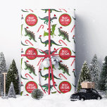 Dinosaur Christmas gepersonaliseerd Cadeaupapier<br><div class="desc">Deze Dinosaur Christmas Personalized Wrapping Paper is voorzien van foto's van kleine speelgoed-dinosaurussen in rode kerstmutsen met het gezegde "Merry Christmas". Personaliseer het: voeg een naam toe in de rode cirkel. Een leuke,  feestelijke kerstcadeaubon voor kleine dinosaurusliefhebbers!</div>