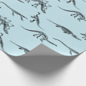 Dinosaur lichtblauw patroon cadeaupapier (Hoek)