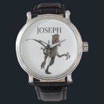 Dinosaur Raptor Naam Monogram Horloge<br><div class="desc">Dit ontwerp kan op het gebied worden gepersonaliseerd dat door de foto en/of tekst te veranderen wordt verstrekt. Of het kan worden aangepast door te klikken deze Sjabloon personaliseert en dan de klik te kiezen om verdere optie aan te passen en de kleur van de achtergrond te schrappen of te...</div>