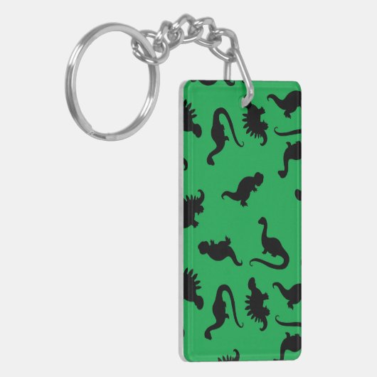 Dinosaur Silhouettes over Groene Achtergrondpatroo Sleutelhanger (Voorkant Links)