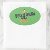 Disgeïntegreerde DAFFY DUCK™ "Duck Season" Ovale Sticker (Tas)